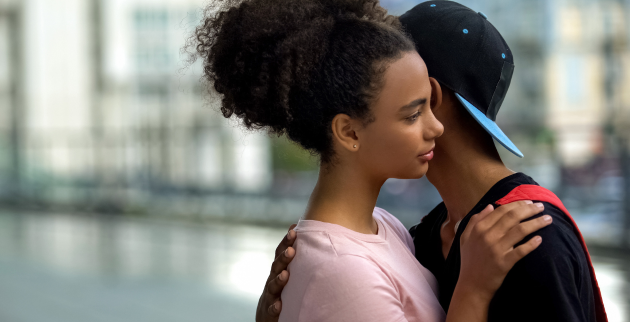 A young couple hugging