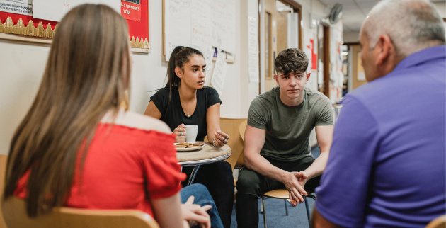 group of young people at a table