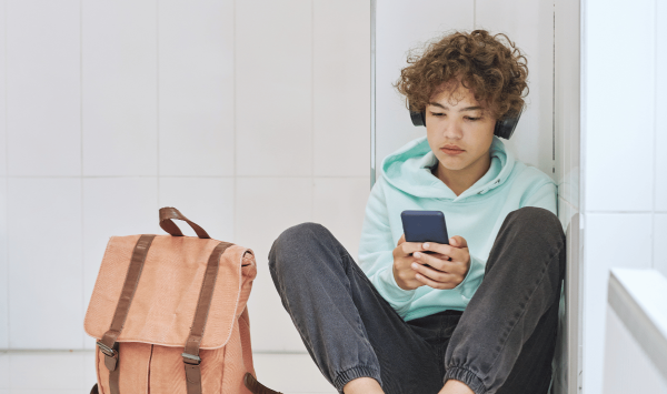 young person using phone