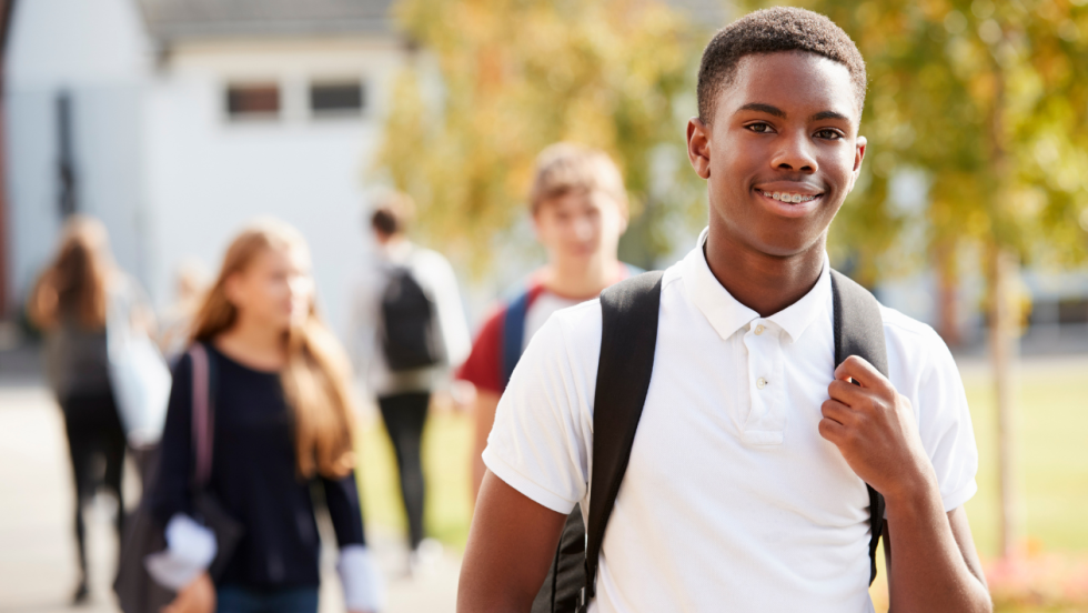 Young student with backpack