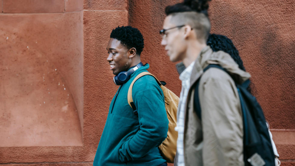 Three young people walking