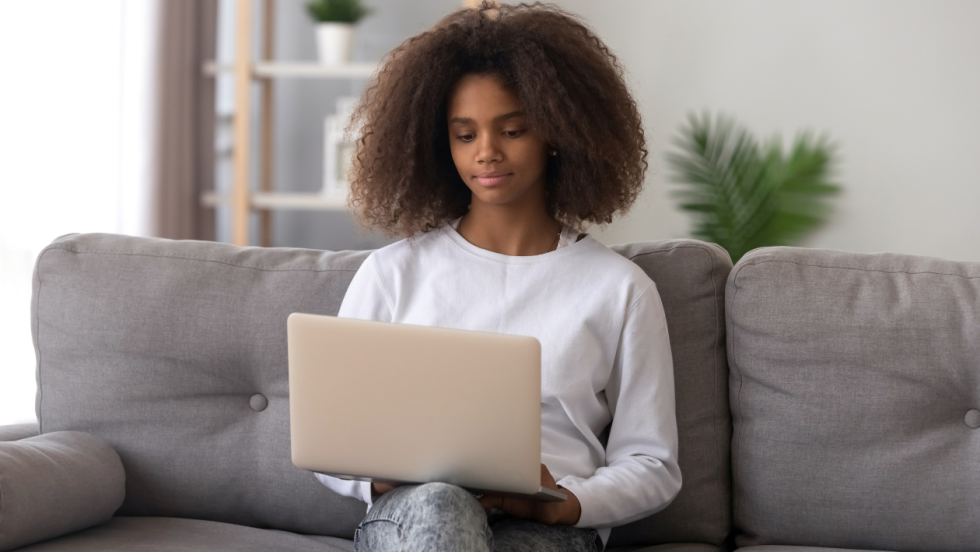 teenager on laptop