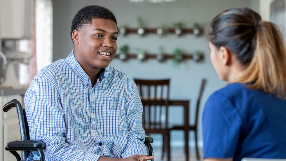 teenager talking to health nurse