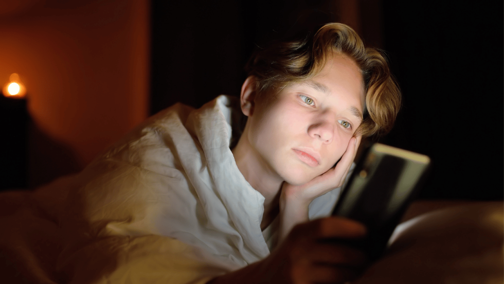 young person using a phone.png