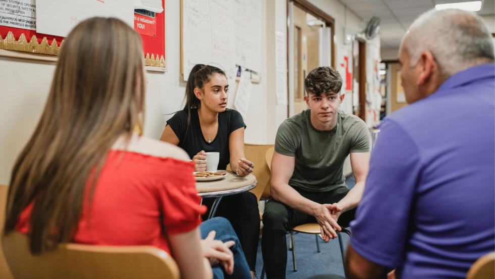 group of young people at a table