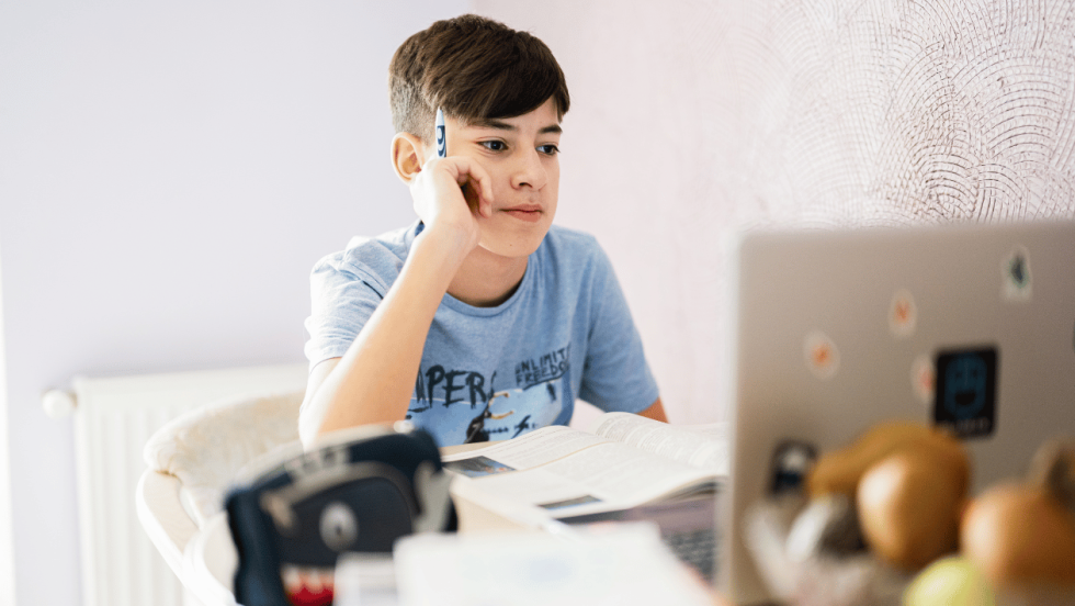 young person on laptop