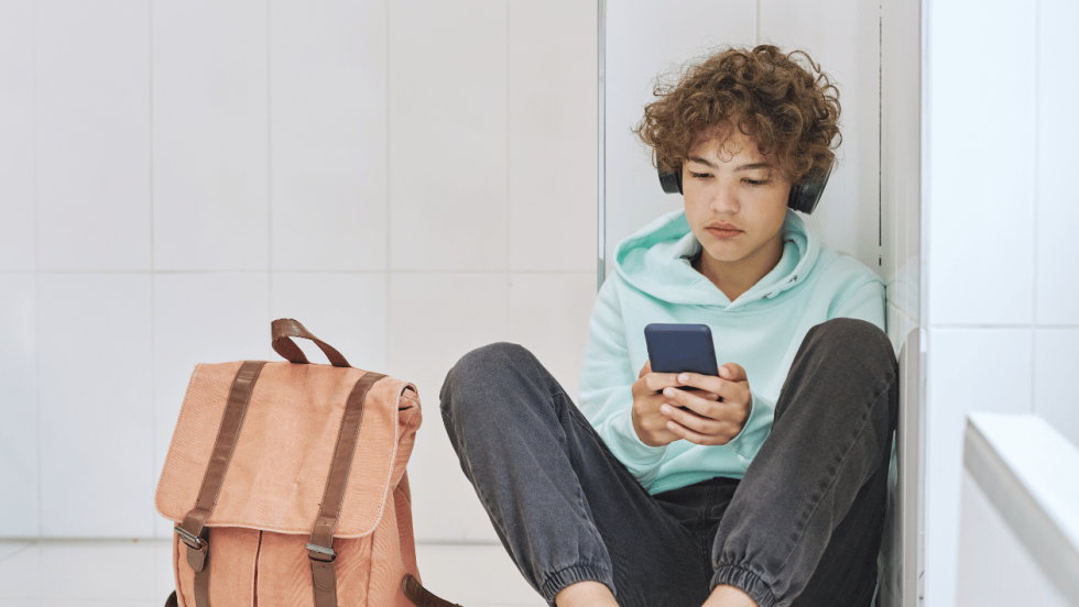 young person using phone