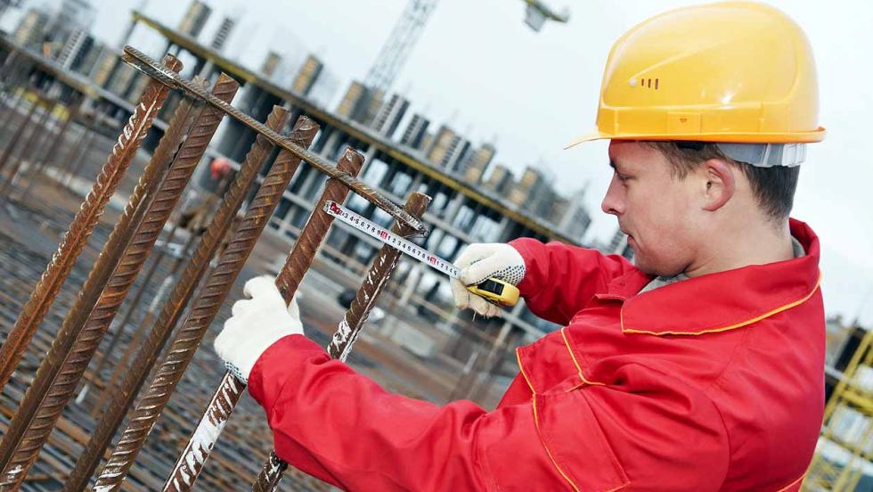 Young man working on a building site