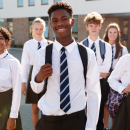 A group of school students posing for the camera