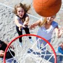 Young people playing basketball