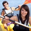 girl and boy kayaking
